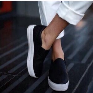 Platform black slip on sneakers